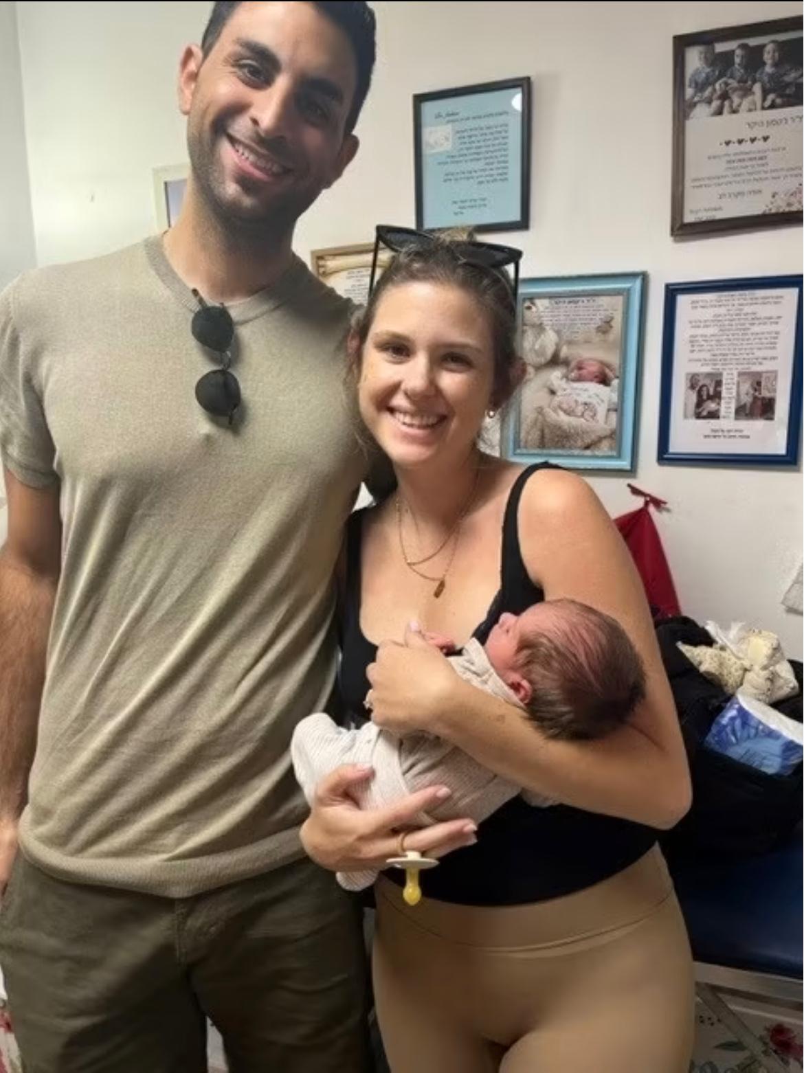 A family with their baby after the brit