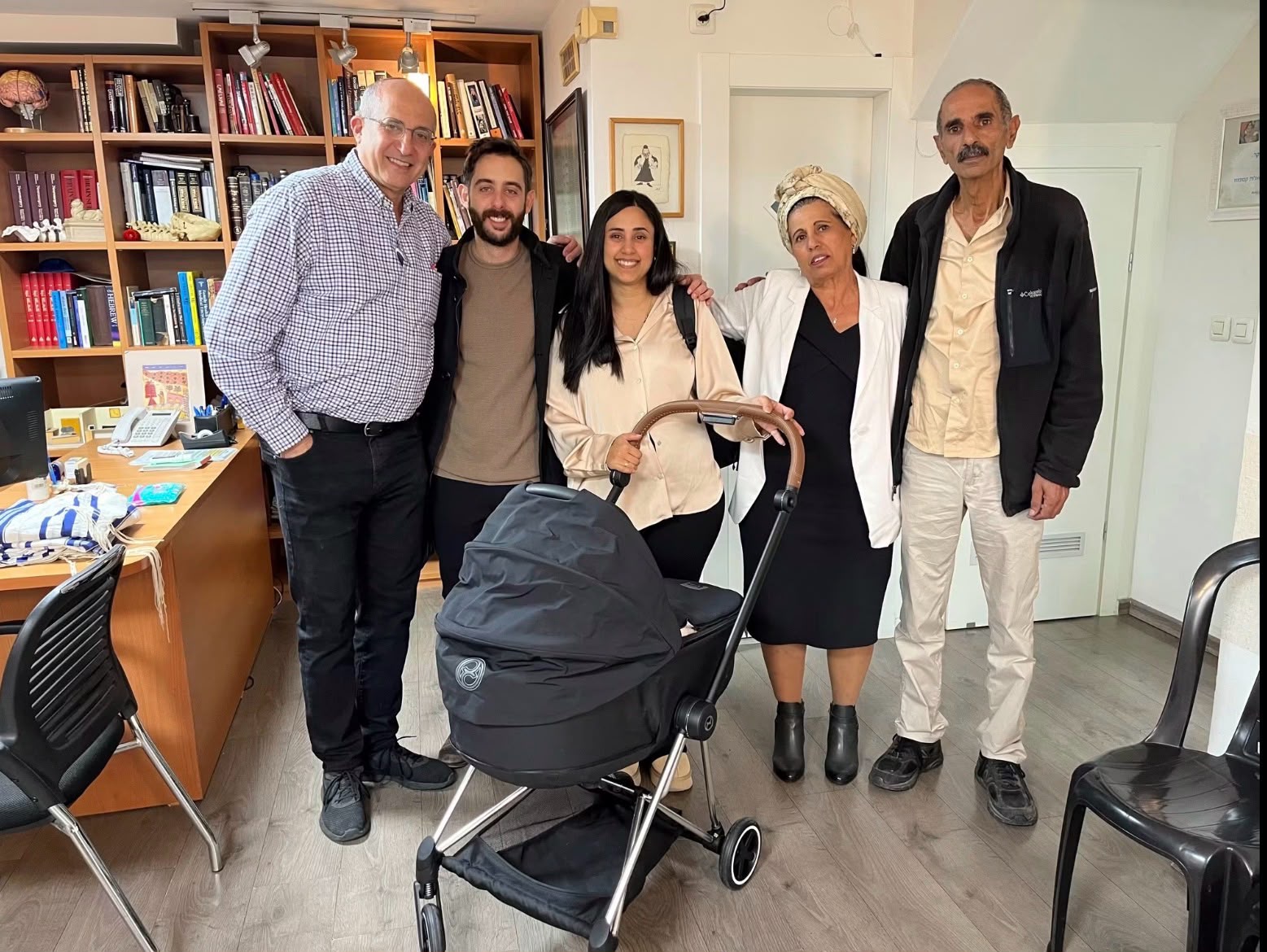 Dr. Jackson with a family at the clinic